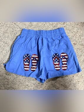 Fantastic Fawn Blue Athletic Shorts with Sequin Flag Flip-Flop Appliqués